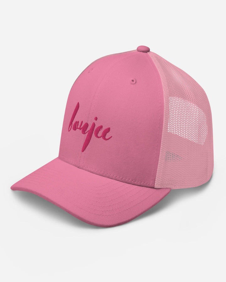 Pink trucker hat with boujee in a bold pink text design, complete with a breathable mesh back, and an adjustable snap closure.