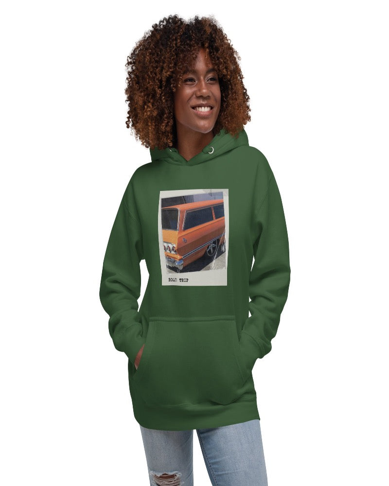 forest green hoodie with an orange vintage car and Road trip design text.