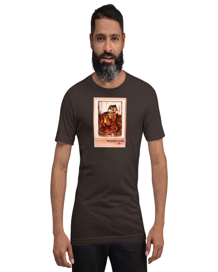 Brown colored T-shirt available in various sizes, featuring a rocks glass of whiskey graphics with a text design "Whiskey Lover" with the logo Kiki Mason Logo