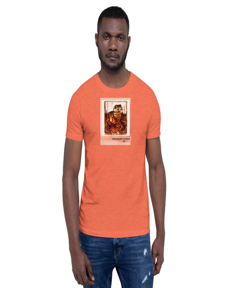 heather orange colored T-shirt available in various sizes, featuring a rocks glass of whiskey graphics with a text design "Whiskey Lover" with the logo Kiki Mason Logo