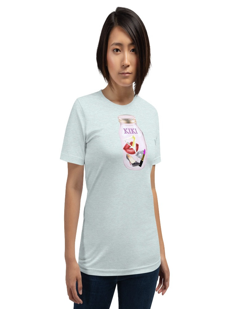 Unisex t-shirt colored heather prism ice blue with KIKI is written on a mason jar below the lid and filled with martini, lipstick, lip, diamond, high heel