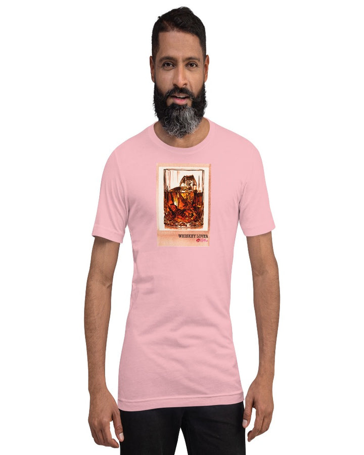 Pink colored T-shirt available in various sizes, featuring a rocks glass of whiskey graphics with a text design "Whiskey Lover" with the logo Kiki Mason Logo