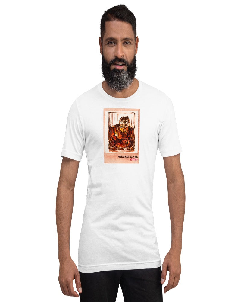 White T-shirt available in various sizes, featuring a rocks glass of whiskey graphics with a text design "Whiskey Lover" with the logo Kiki Mason Logo