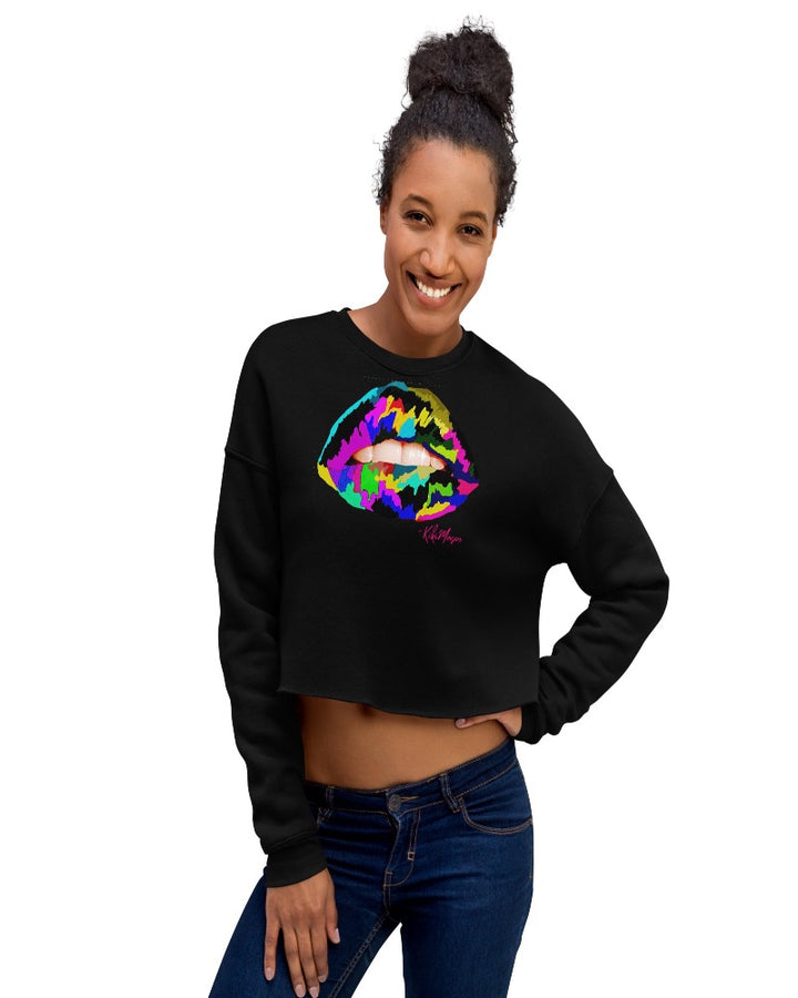 Black crop sweater with multicolored lip design.