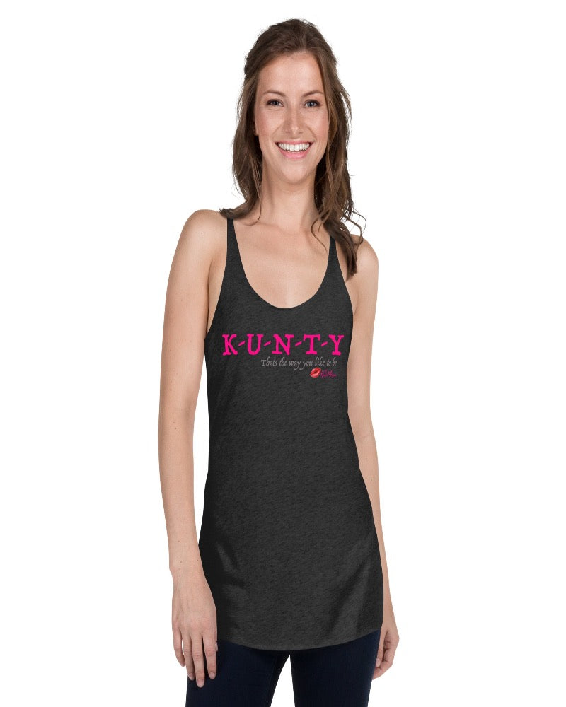 Black vintage racer back tank top with “K-U-N-T-Y” in hot pink raspberry text design, with soft grey “That’s the way you like to be” text design. Plain black back.